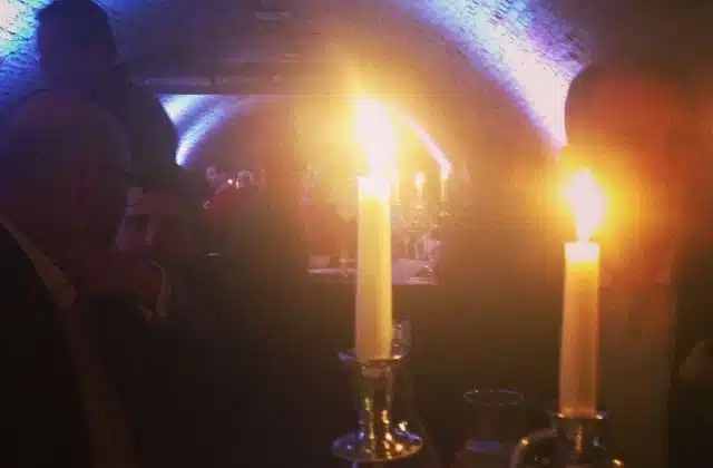Two candles at Cafe de Mort