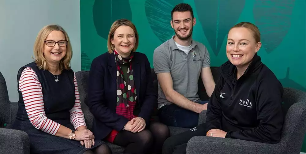 (L-R) Sam Austin, deputy chief executive at Llamau, Julie-Ann Haines, chief customer officer at PBS, Dale Evans