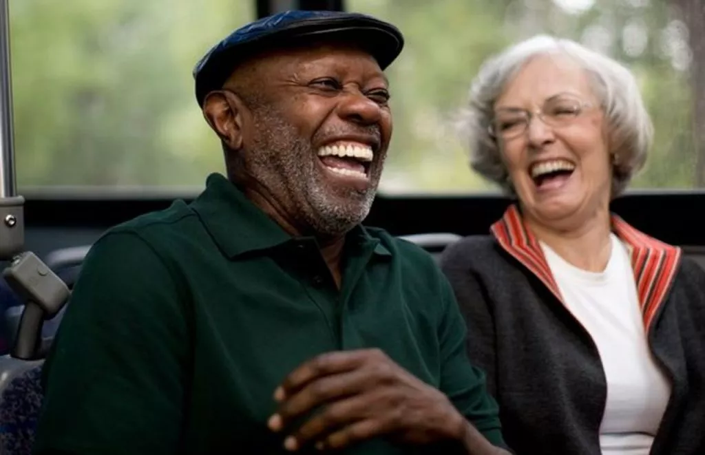 Donors - man and woman laughing