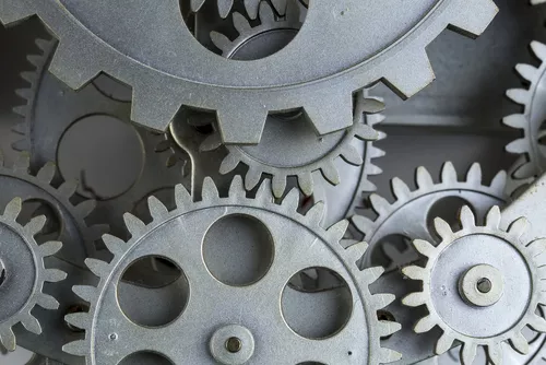 Cogs meshed together like a machine
