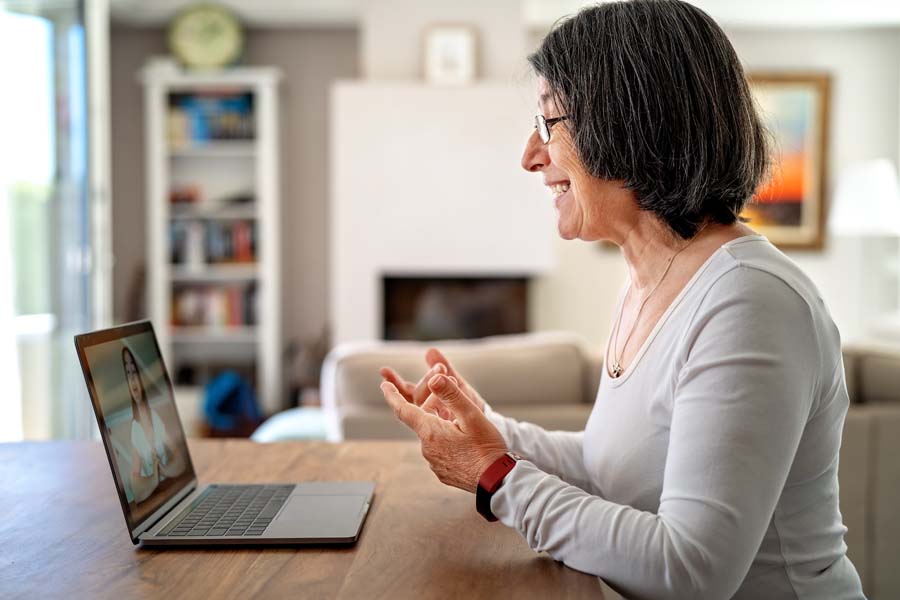 Woman at laptop on a desk
