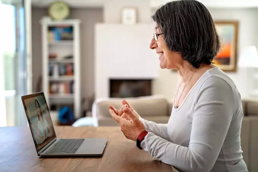 Woman at laptop on a desk