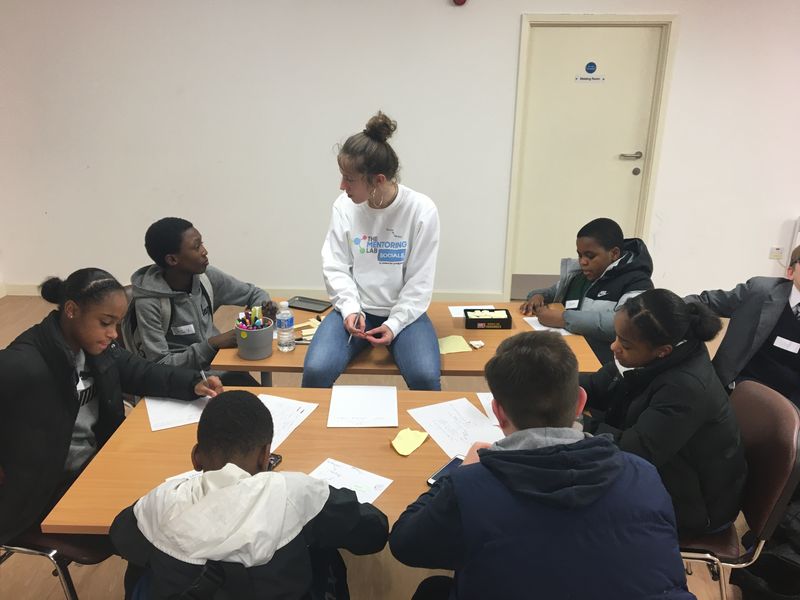 The Mentoring Lab - children studying with mentor
