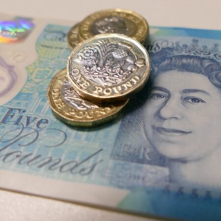 Money - a £5 note and pound coins Image by ScouserUK from Pixabay