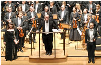 New London Orchestra standing to take the applause