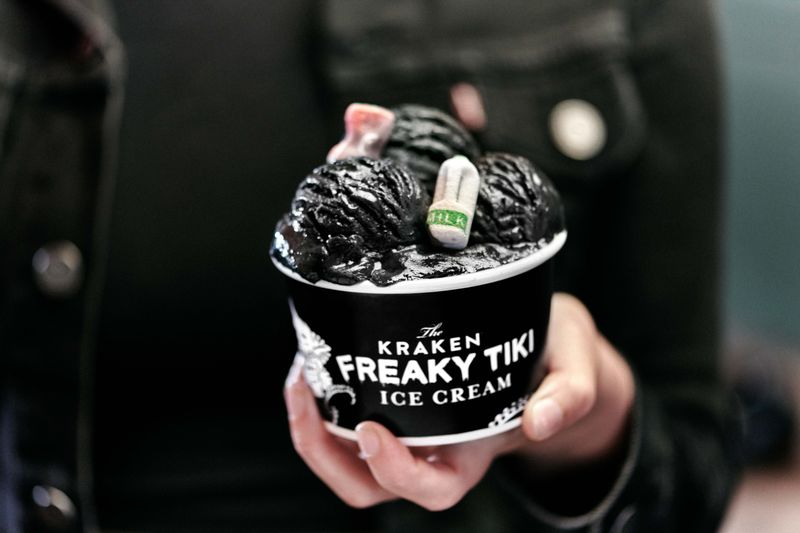 Someone making a donation to charity for eating Kraken ice cream