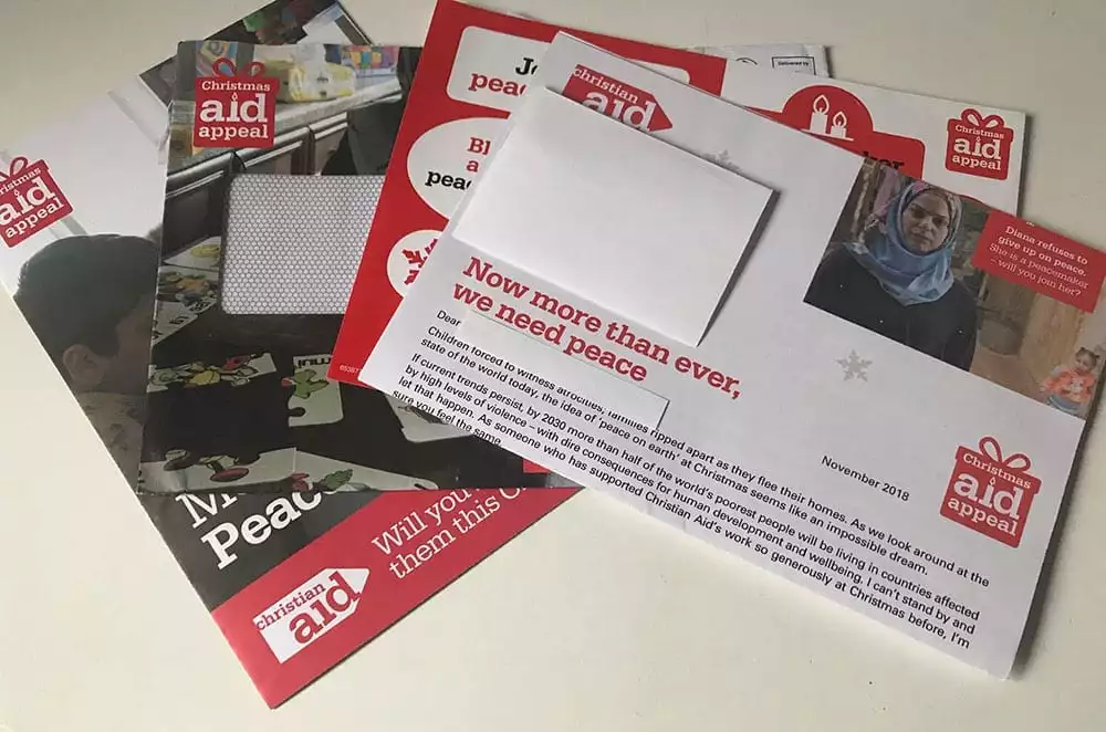 Christian Aid's Christmas appeal from November 2018, laid out on a desk