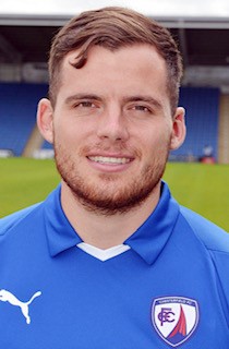 Jordan Sinnott in a blue football shirt