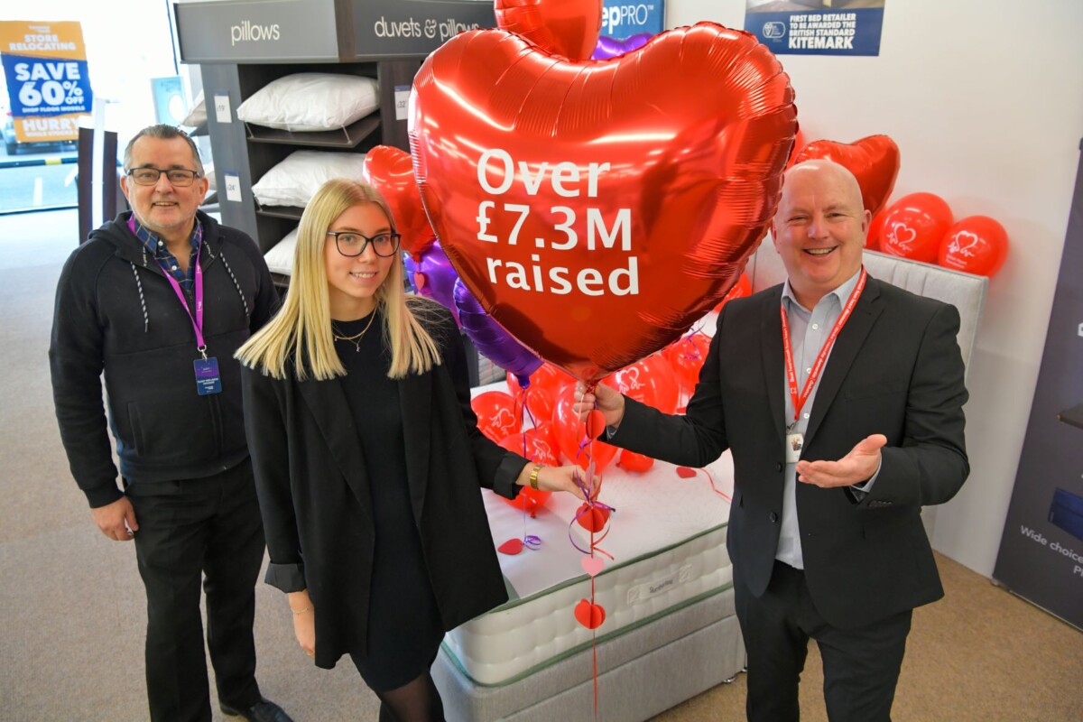 L-to-R John Maitland and Emily Coles from Bensons for Beds with British Heart Foundation retail area manager Nigel Marston