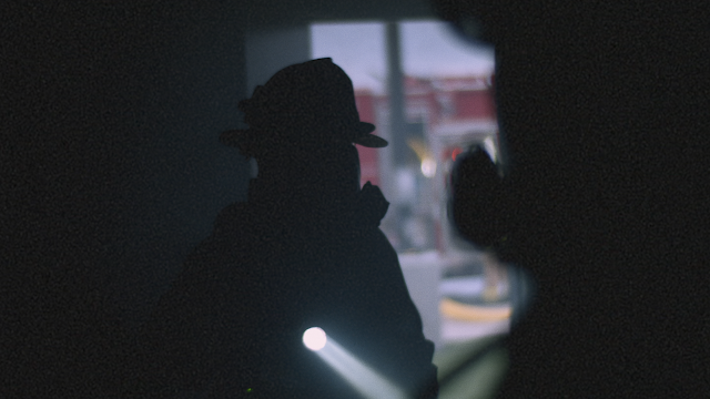 Fireman shines torch. Photo: We The Helpers