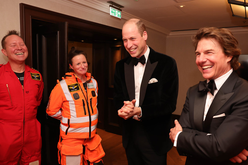The Prince of Wales and Tom Cruise with staff from London's Air Ambulance Charity. Credit: The Prince & Princess of Wales