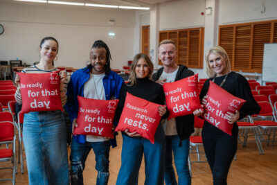 S Club learn CPR at a school visit