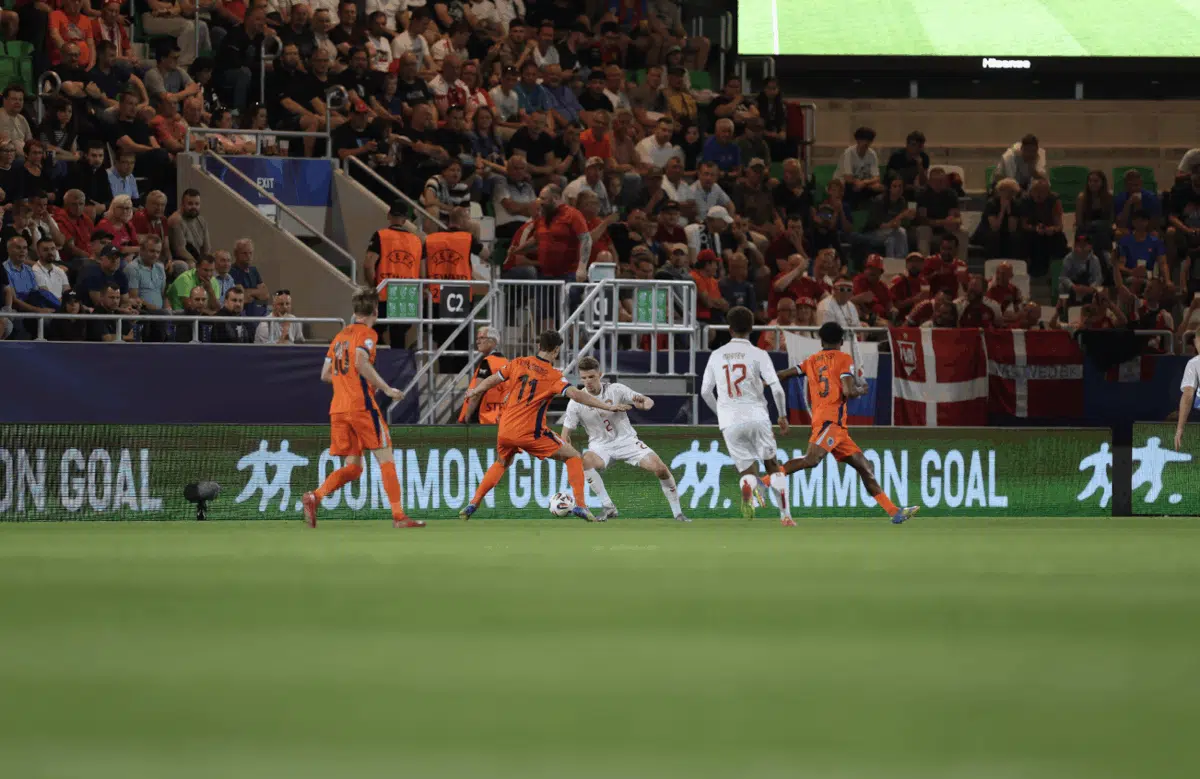 Pitchside promotion of Common Goal at a football match.
