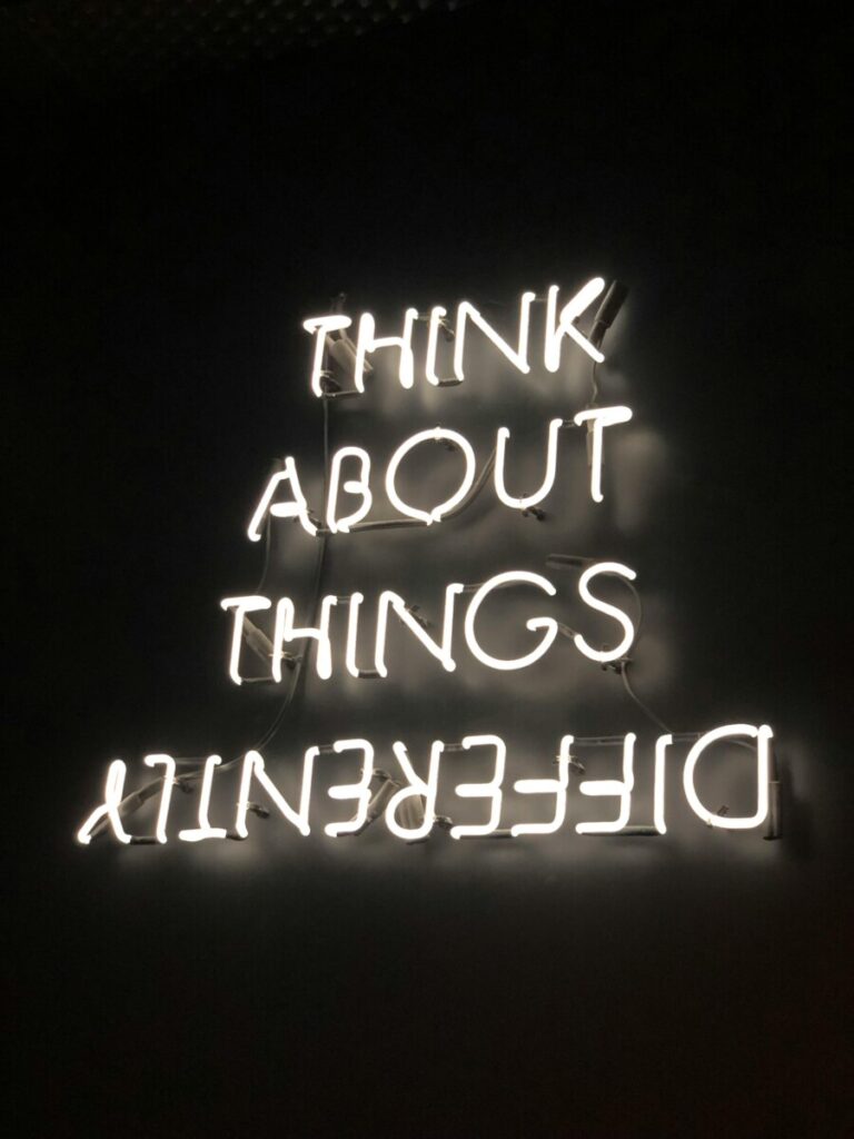 Neon sign on black background - 